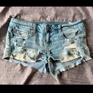 American Eagle Outfitters Blue Distressed Ripped Jean Shorts lace pockets size 8